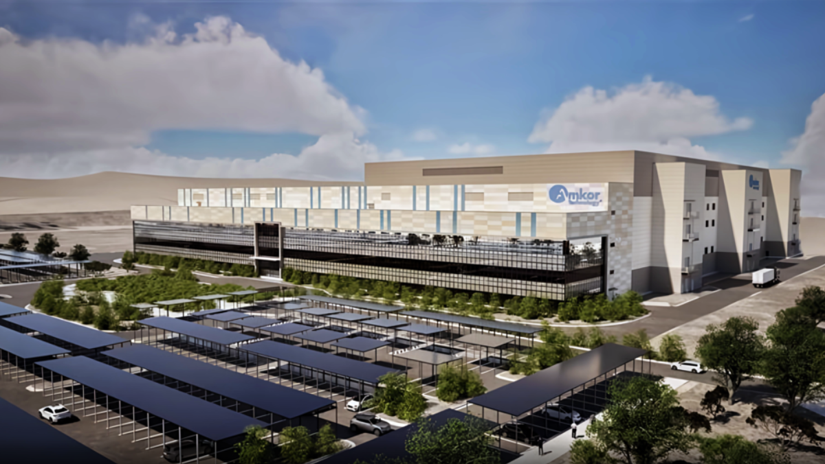 Large semiconductor packaging facility in Arizona with solar canopies and desert landscape.